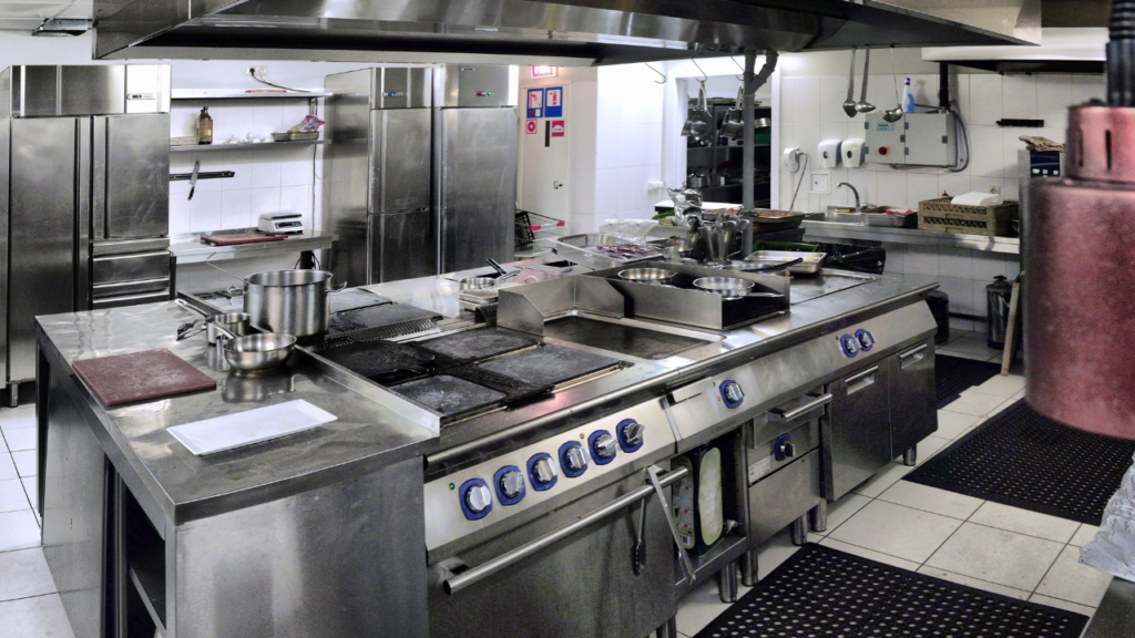 A kitchen with many different types of appliances.