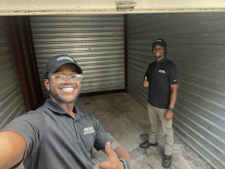 Pro Hauling team performing a storage unit cleanout in Greensboro NC removing furniture and boxes